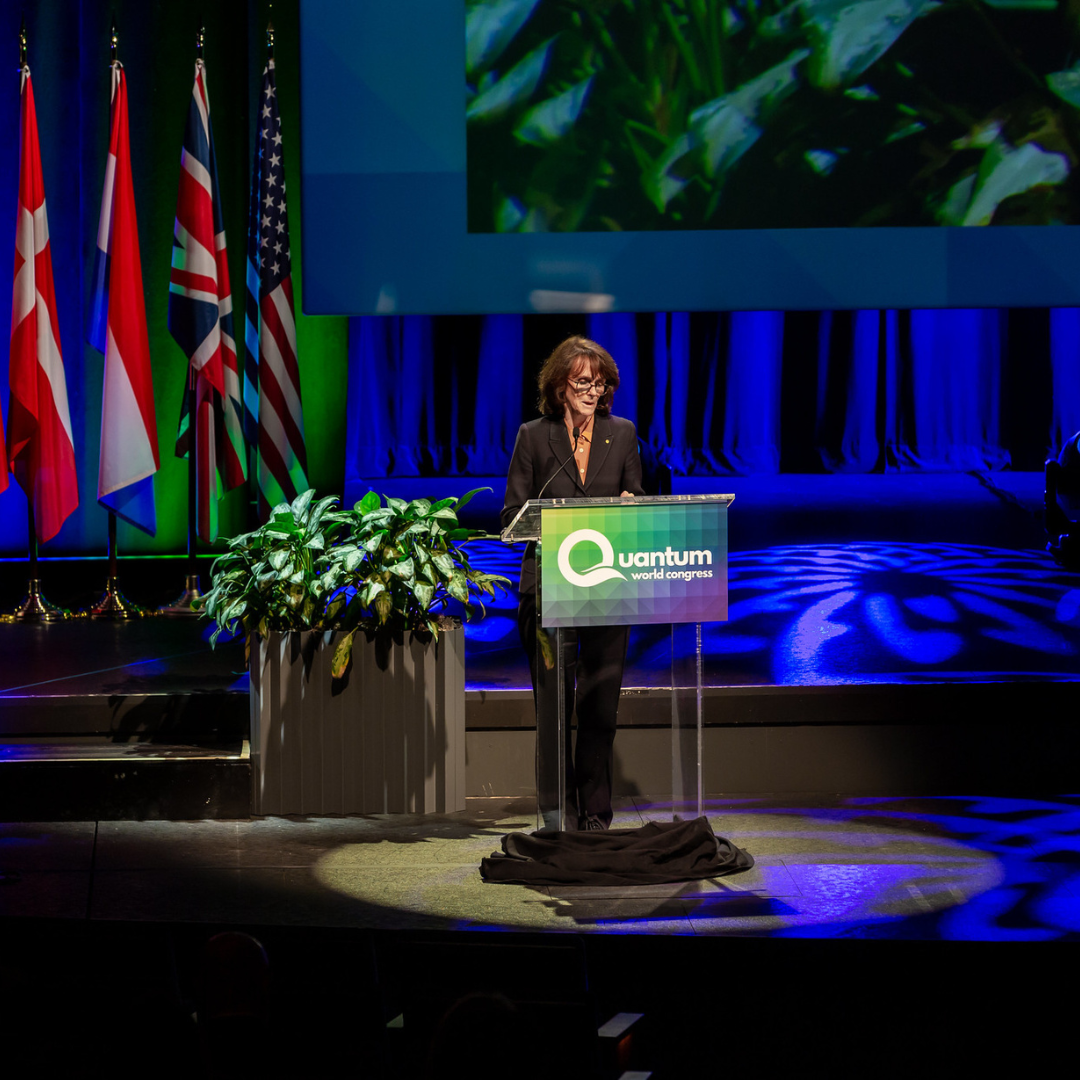 Dr Foley speaking at a lectern 